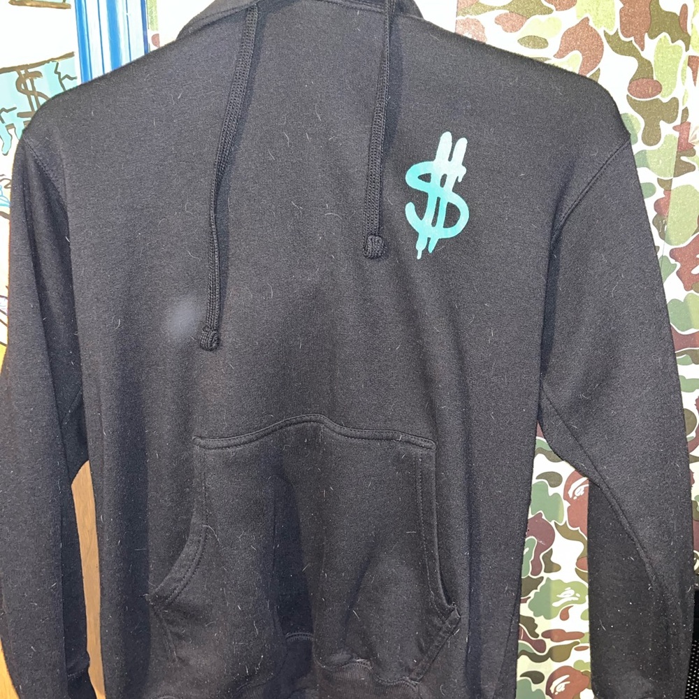 Black Hoodie with Teal Dollar Sign